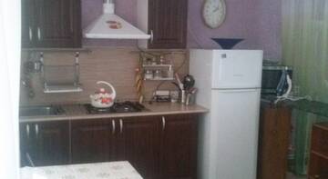 Фото номера Улучшенный четырехместный номер Гостиница Guest House Vladimir г. Ейск 4