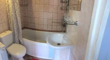 Фото номера Апартаменты с 2 спальнями Апартаменты Apartment Na Yanysheva г. Ейск 8