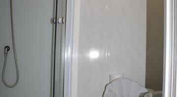Фото номера Семейный номер Гостевой дом Rostovskaya 181 Inn г. Ейск 2