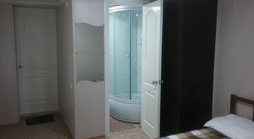 Фото номера Семейный номер Гостевой дом Rostovskaya 181 Inn г. Ейск 9