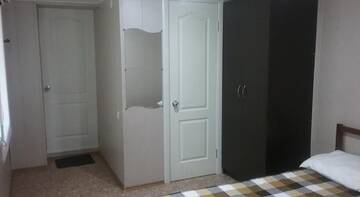 Фото номера Семейный номер Гостевой дом Rostovskaya 181 Inn г. Ейск 10
