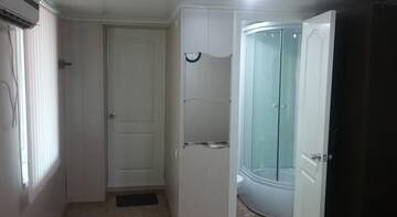 Фото номера Семейный номер Гостевой дом Rostovskaya 181 Inn г. Ейск 5