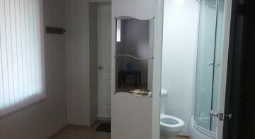 Фото номера Семейный номер Гостевой дом Rostovskaya 181 Inn г. Ейск 8