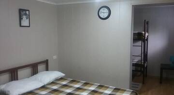 Фото номера Семейный номер Гостевой дом Rostovskaya 181 Inn г. Ейск 11