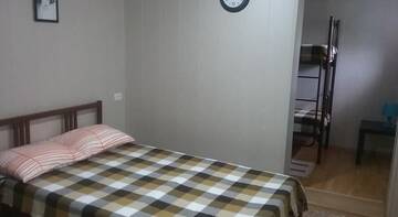 Фото номера Семейный номер Гостевой дом Rostovskaya 181 Inn г. Ейск 6