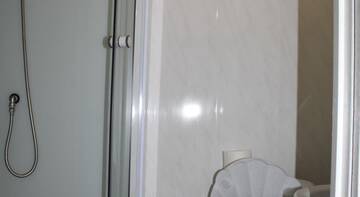 Фото номера Классический четырёхместный номер Гостевой дом Rostovskaya 181 Inn г. Ейск 10