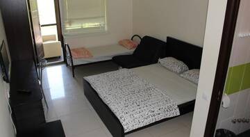 Фото номера Четырехместный номер Гостиница Guest House Morskaya 265 г. Ейск 4