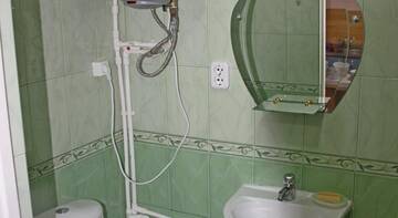 Фото номера Стандартные апартаменты Гостиница Viktoria Guest House г. Ейск 9
