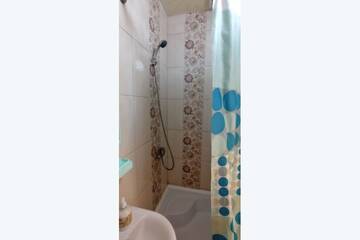 Фото номера Трехместные апартаменты с кухней Апарт-отель Роза Ейска г. Ейск 7