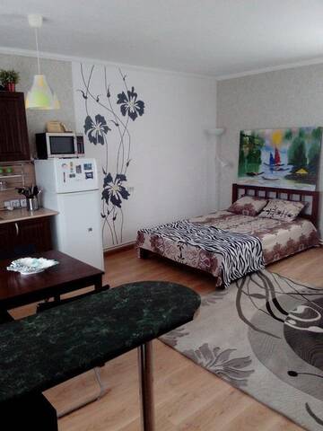 Фото номера Улучшенный четырехместный номер Гостиница Guest House Vladimir г. Ейск 2